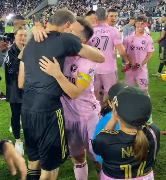 Giorgio Chiellini (left) and Lionel Messi pictured sharing a hug after Messi had posed for a photo with Chiellini's eight-year-old daughter Nina following Inter Miami's 3-1 win over LAFC in September 2023
